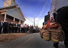 WoodrowPrice-Funeral-ConverseFD--7 copy  Firefighters with Converse Area Fire Department, carrying the uniform of  Woodrow (Woody) C. Price, march up a hill from the fire station to Converse Baptist Church, for the funeral of their fellow firefighter. The &#34;Chief Emeritus at Converse Fire Department&#34; was the last founding member of the department, having worked with it for 48 years.  (NOTE: with Jason Spencer story)